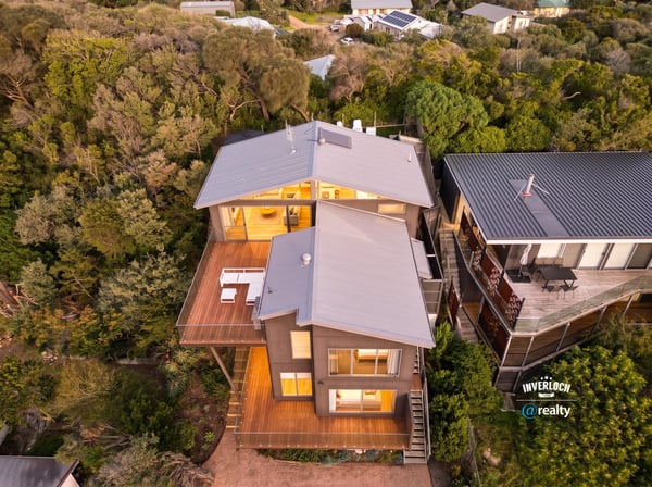 Discover this modern coastal retreat, featuring dynamic architecture and expansive outdoor living spaces surrounded by nature.