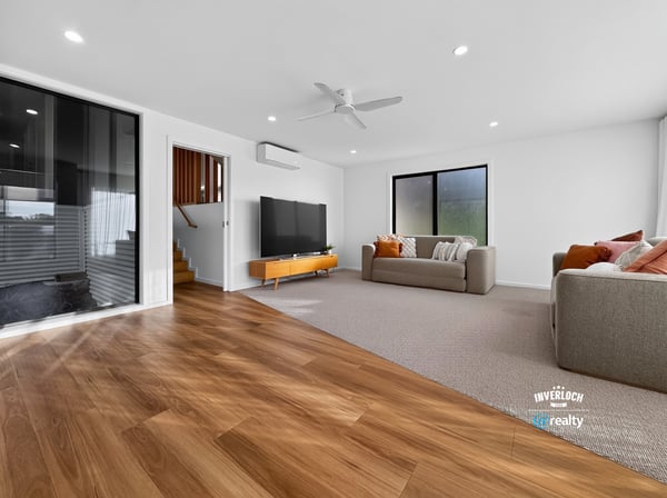 Bright and spacious living area featuring modern design and seamless indoor-outdoor flow.