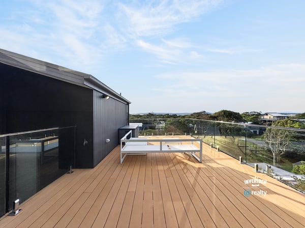 Enjoy breathtaking views from this spacious deck, perfect for outdoor gatherings and relaxation.