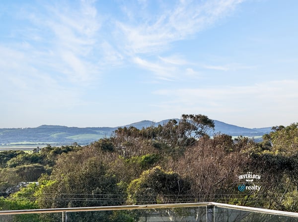 Breathtaking views of rolling hills and lush greenery create a captivating backdrop for your dream home.