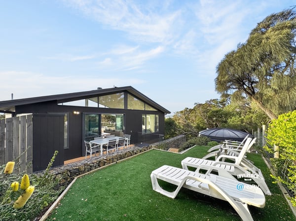 Contemporary home featuring lush outdoor space, perfect for entertaining and enjoying scenic views.
