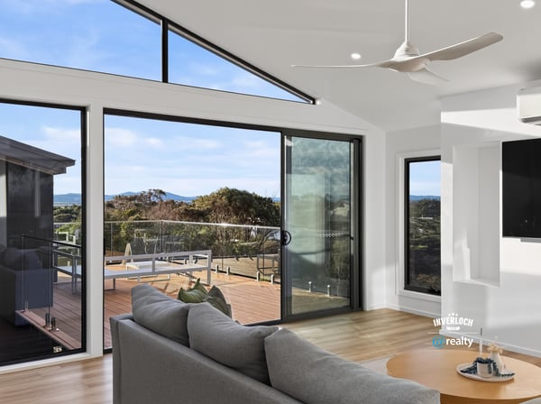 Bright open-plan living space with expansive views and seamless indoor-outdoor flow, perfect for modern living.