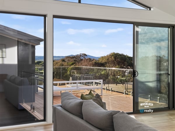 Spacious living area with expansive views, featuring large windows that invite abundant natural light.