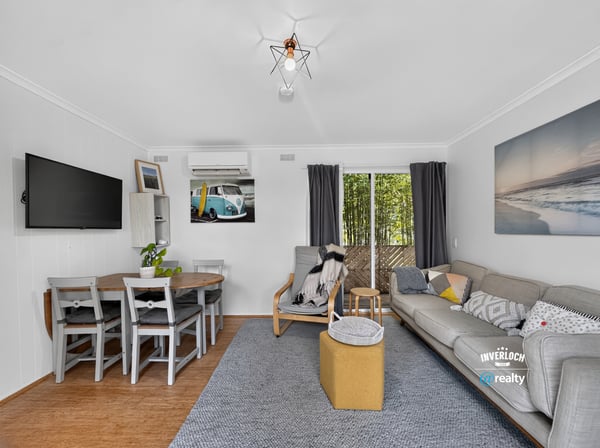 Bright and inviting living area with modern furnishings, perfect for relaxation and entertaining.