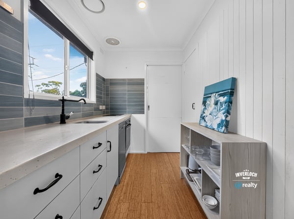 Bright kitchen featuring modern appliances and ample storage, perfect for culinary enthusiasts and everyday living.