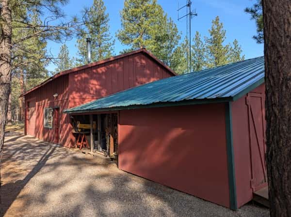 46 of 61. 28'x30' shop with 28'x16' RV bay and two additional 22'x14' finished, insulated flex/clean rooms -- perfect for a home office, game room, fitness studio, craft space, or more! The 2-car oversized garage has heated storage, dedicated wood storage, and a storage room. Plus exterior shed and wood storage.
