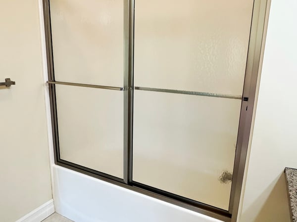 Fiberglass tub/shower & ceramic tile floor