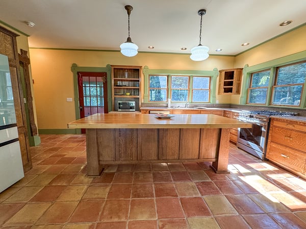 Kitchen. Saltillo Tile Floor. Custom Island. Samsung Bespoke Fridge. NEW Stove