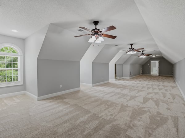 Expansive bonus room which offers some many possibitlies to used as flex space. Perfect for work-from-home needs, a guest room, or TV room.