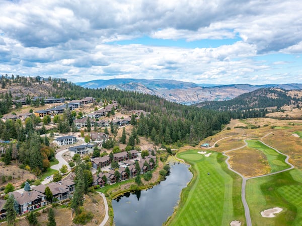 Discover this spacious property nestled among lush landscapes and a pristine golf course with breathtaking mountain views.