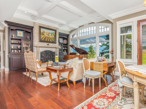 Spacious open-concept living area features abundant natural light, stunning lake views, and tasteful finishes throughout.