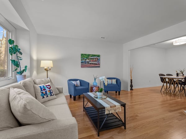 Living room with large window and new hardwood floors
