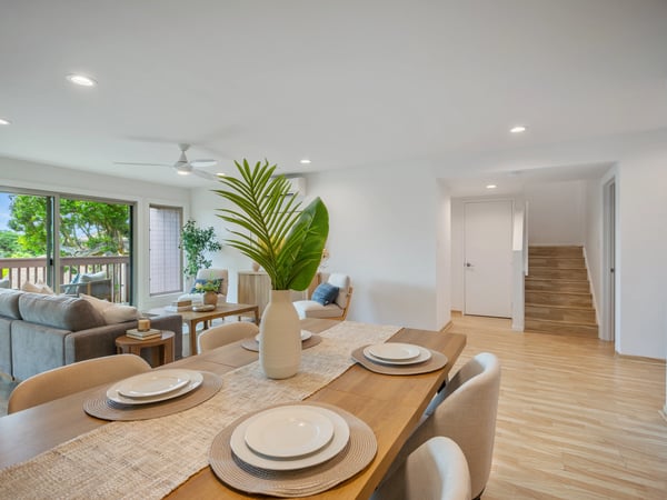 Bright and airy open-concept living space featuring a spacious dining area and modern finishes.