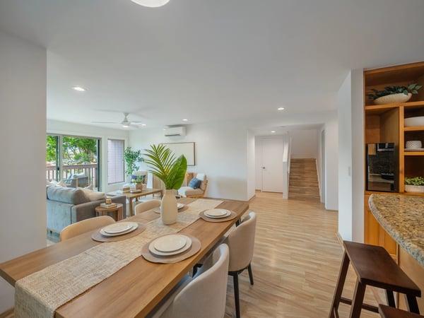 Bright and inviting open-concept living space featuring modern finishes and ample natural light throughout.