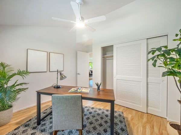 Bright and inviting workspace featuring modern finishes, ample natural light, and a spacious closet.