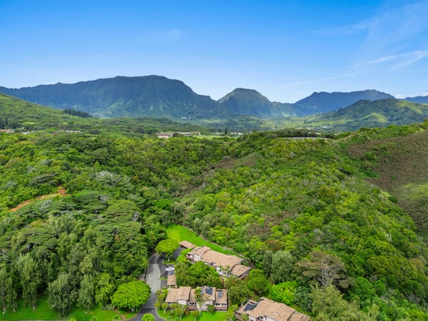 Nestled in lush landscaping, this property offers breathtaking mountain views and an idyllic retreat atmosphere.