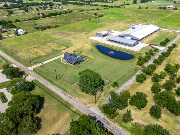 PROPERTY AERIAL...Beautiful Custom Home On 55+ Acres With Incredible Horse Facilities In Great Location And Road Frontage On 2 Sides!
