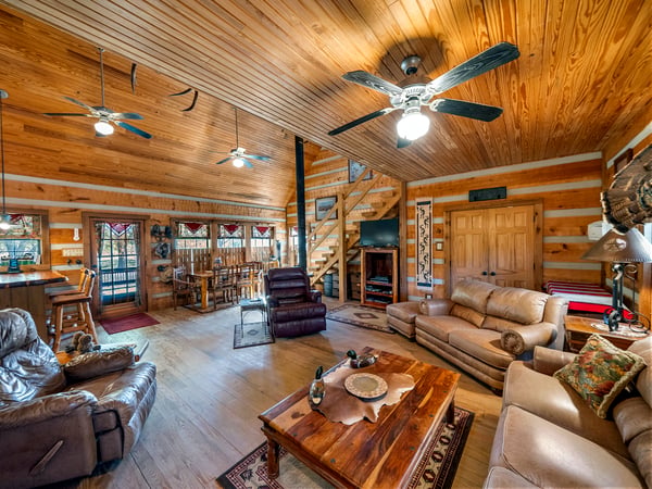 LOG CABIN INTERIOR...Wood Floor, Wood Vaulted Ceiling, Open Floorplan, Wood Burning Stove