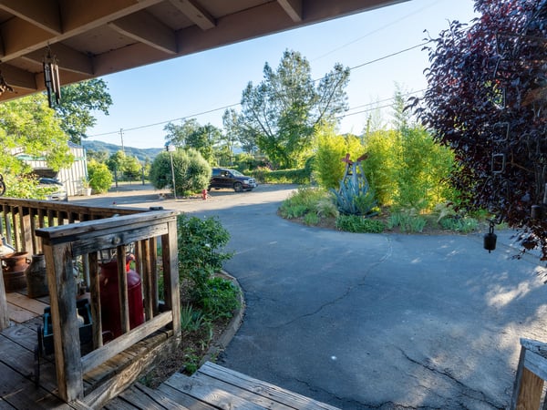 VIEW OF FRONT DRIVEWAY FROM FRONT DECK