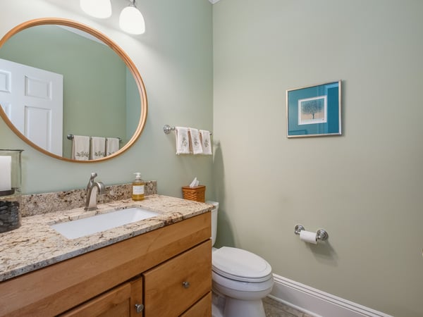 First floor powder room by garage entrance