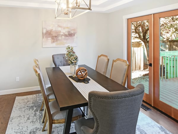 Bright dining area featuring , ample space for seating, and direct access to an outdoor patio.