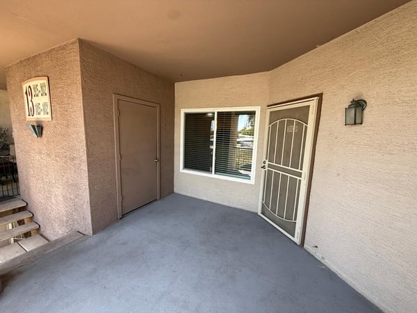 Covered entry patio creates a warm welcome while providing additional outdoor living space. This private entrance adds comfort and convenience to everyday living.