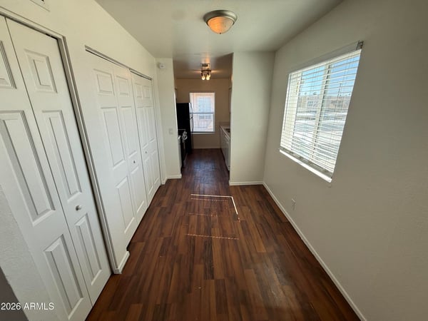 Bright dining space accented by large windows and attractive flooring. Conveniently positioned between the living area and kitchen, it creates an ideal flow for daily living and entertaining.