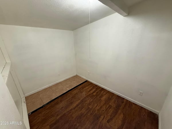 Dedicated flex room perfect for a home office, study area, or creative workspace. Featuring wood-look flooring and a private layout, this room offers excellent functionality and flexibility.