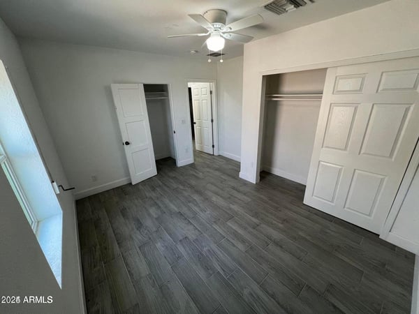 This comfortable bedroom showcases clean lines, contemporary finishes, closet storage, and natural light. A welcoming space designed to support restful living and daily comfort.