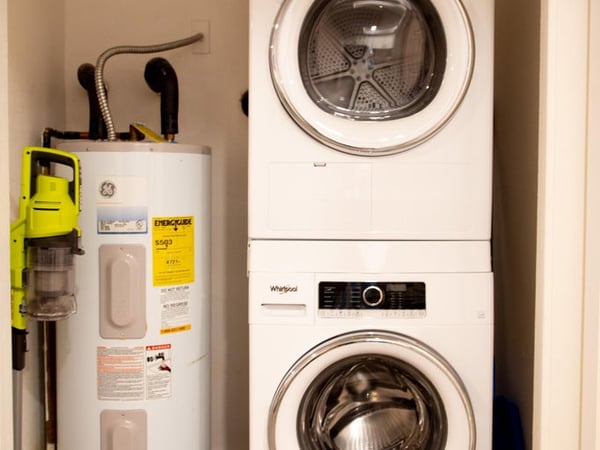 Convenient in-unit laundry with stacked washer and dryer adds efficiency and practicality to everyday living. This desirable feature enhances the home's move-in-ready appeal and low-maintenance lifestyle.