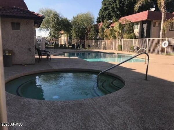 The relaxing community Jacuzzi offers residents a soothing escape after a busy day. Combined with nearby pool amenities, it contributes to the property's desirable lifestyle appeal.