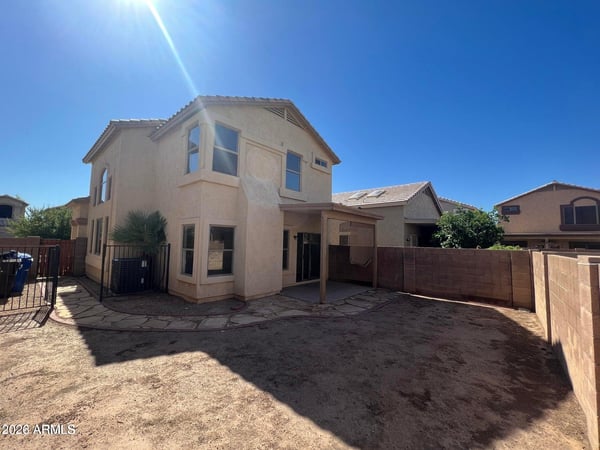 Relax and unwind under the covered patio while enjoying a spacious backyard designed for low-maintenance living. The open outdoor space offers room for gatherings, play areas, future landscaping improvements, or personalized outdoor features.