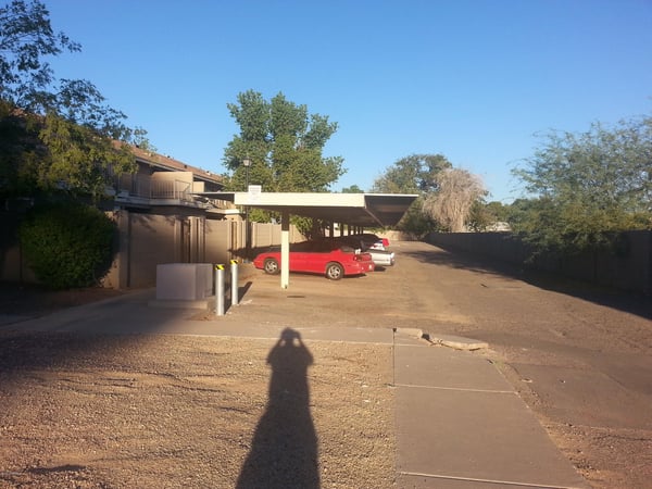 Dedicated covered parking space with rear vehicle access offers protection from the elements while providing convenient access to your Glendale townhouse.