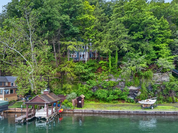30 feet of easy to maintain Level Waterfront.