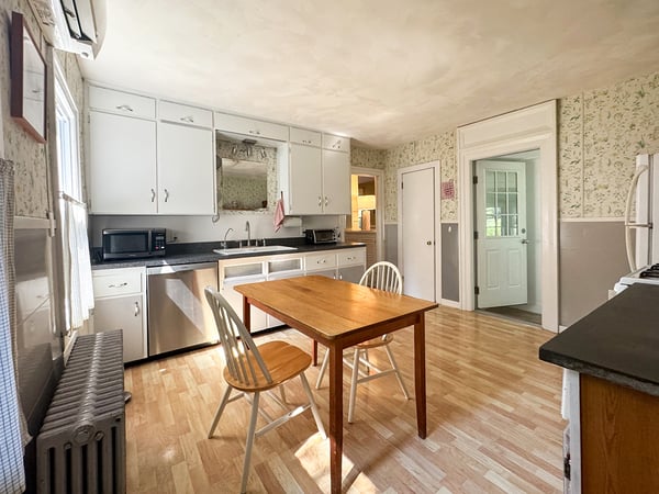 Kitchen opens to Sunroom