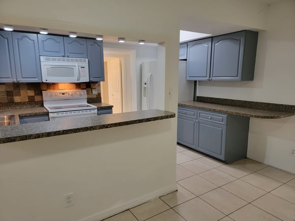 Functional kitchen featuring modern appliances, ample counter space, and an open layout for seamless entertaining.