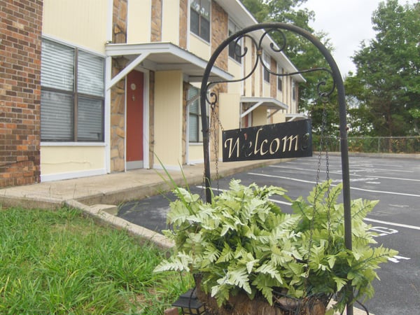 Discover this inviting multi-unit property, featuring cozy living spaces and convenient parking options.