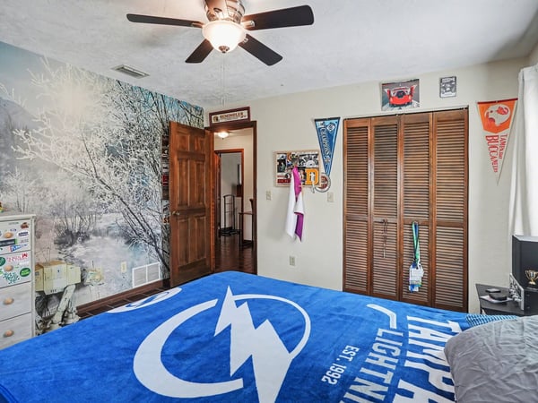 Another view of the second bedroom, looking out towards the hallway.