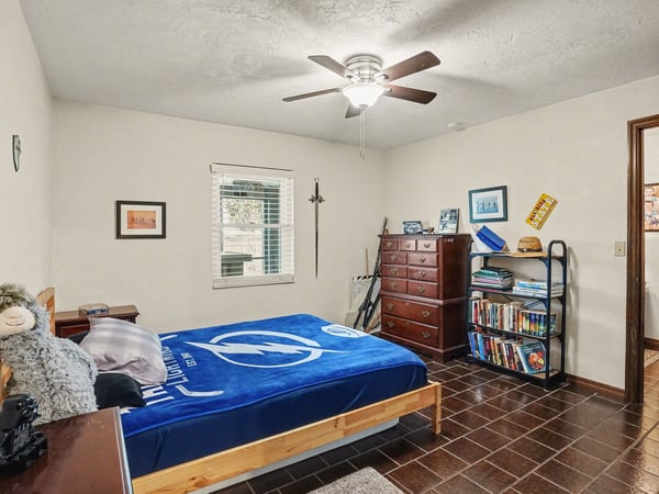 Another view of the first bedroom from the door located off of the hallway across from the bathroom.