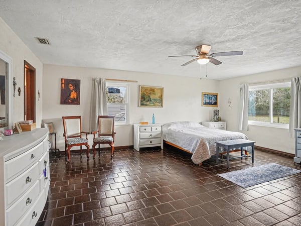 The Master Bedroom with an ensuite bathroom, newly remodeled and very large! Previous owners had a California King sleigh bed. Make it a private oasis- make it your own!