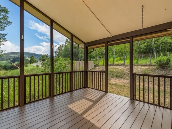 Screened covered deck