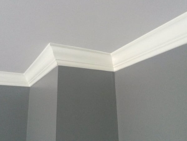 Showcasing modern crown molding in available townhomes, this photo highlights the clean lines and contemporary finish of the interior space.
