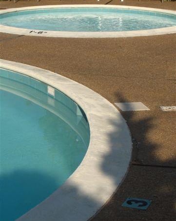 Discover a refreshing outdoor retreat featuring multiple inviting pools perfect for relaxation and recreation.