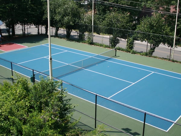 This property features a well-maintained tennis court and basketball area, perfect for active lifestyles.