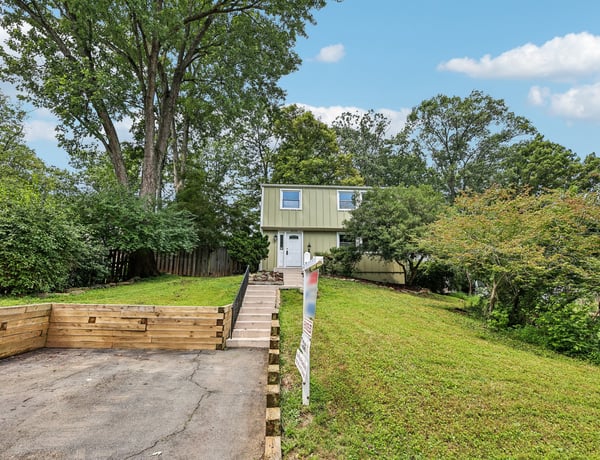 Discover this unique home nestled on a spacious lot, ideal for outdoor activities and gardening.