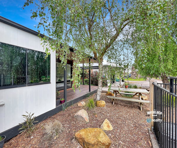 This property features a modern home surrounded by landscaped outdoor spaces ideal for entertaining and relaxation.