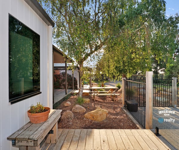 Modern outdoor space featuring a tranquil garden area, perfect for relaxation and entertaining.