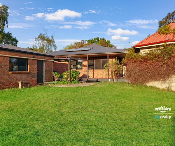 Spacious outdoor area complements this inviting property, perfect for relaxation and entertaining in a family-friendly neighborhood.