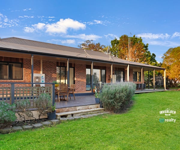 Spacious outdoor area complements this inviting home, perfect for entertaining and enjoying nature’s beauty.