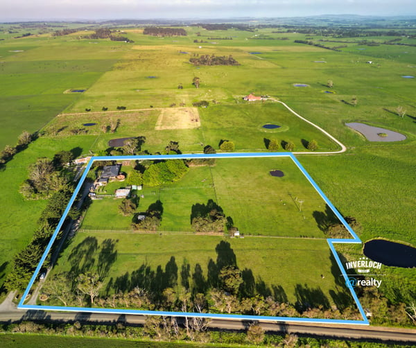 Spacious rural property with ample land, scenic views, and potential for agricultural or recreational use.